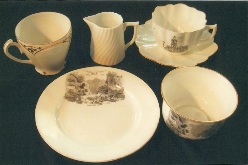 Teacup and jug, Wanganui Post Office cup and saucer. In front, Wanganui River Drop scene plate and bowl.