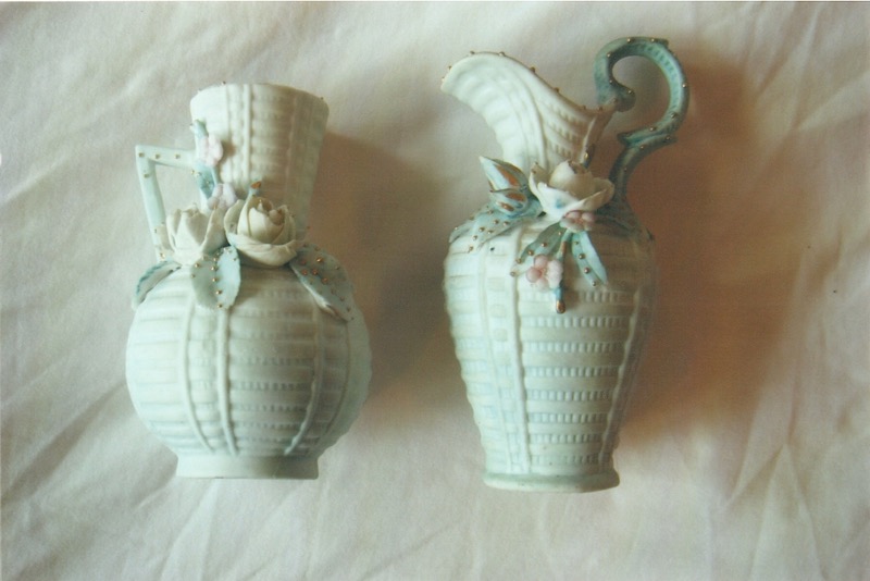 Decorated jugs found in a box that belonged to Mary Oliver (1863-1947) above the ceiling trapdoor in the Thomas and Jessie (nee Oliver) Bradley home on No. 3 Line, Okoia. Mary, older sister of Jessie, in latter years lived between Bertha and brother Louis Oliver. The left one has a missing matching handle