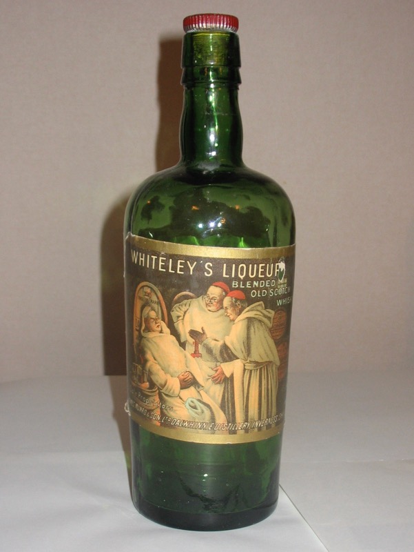 The Whisky bottle that was presented to Mary Oliver upon her retirement after loyal service at Bellamys in Parliament Buildings.
