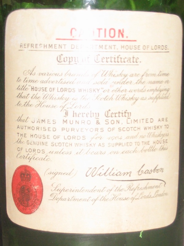 Certificate label on the reverse side of the whisky bottle declaring that it is the genuine scotch whisky as supplied to the House of Lords.