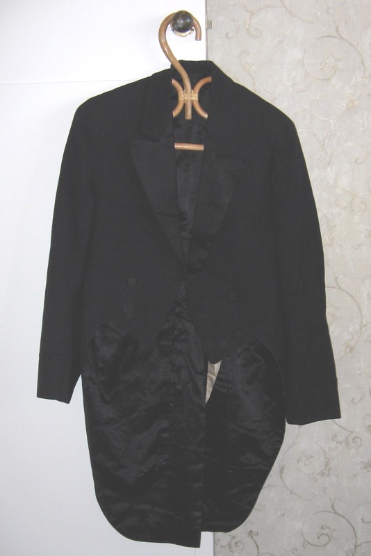 Mens' suit with tails