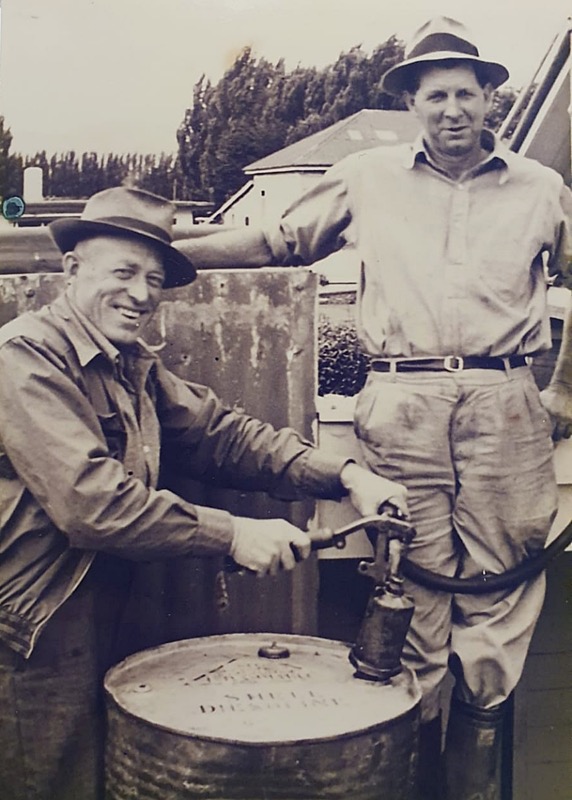 Bill Byleveld (left and not related) & Ivor Oliver (right) pumping Shell diesel from a 40-gallon drum
