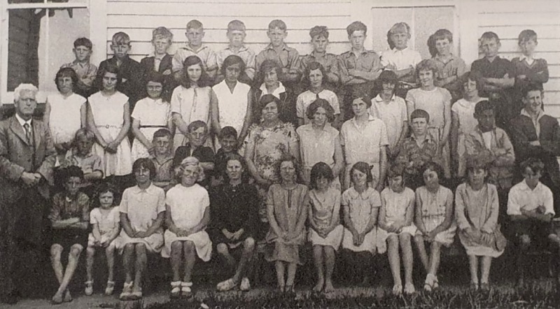 Robert Handley Florance, headmaster Clive Grange School, with students in 1928. Later, in 1935 was called Haumoana School.