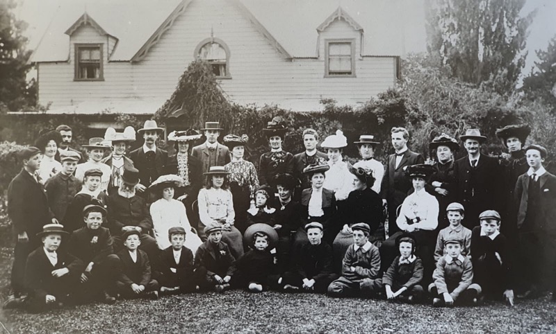 Photograph from New Caledonian Road. Augustus (Gus) b.1879 is standing at the very rear on the left. Robert H Florance b.1881 is standing at the rear eighth from right. Elizabeth Florance (nee Hamilton) 1848-1925 is seated in the middle on the right of a little boy.